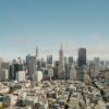 Modern city skyline with tall buildings under clear sky
